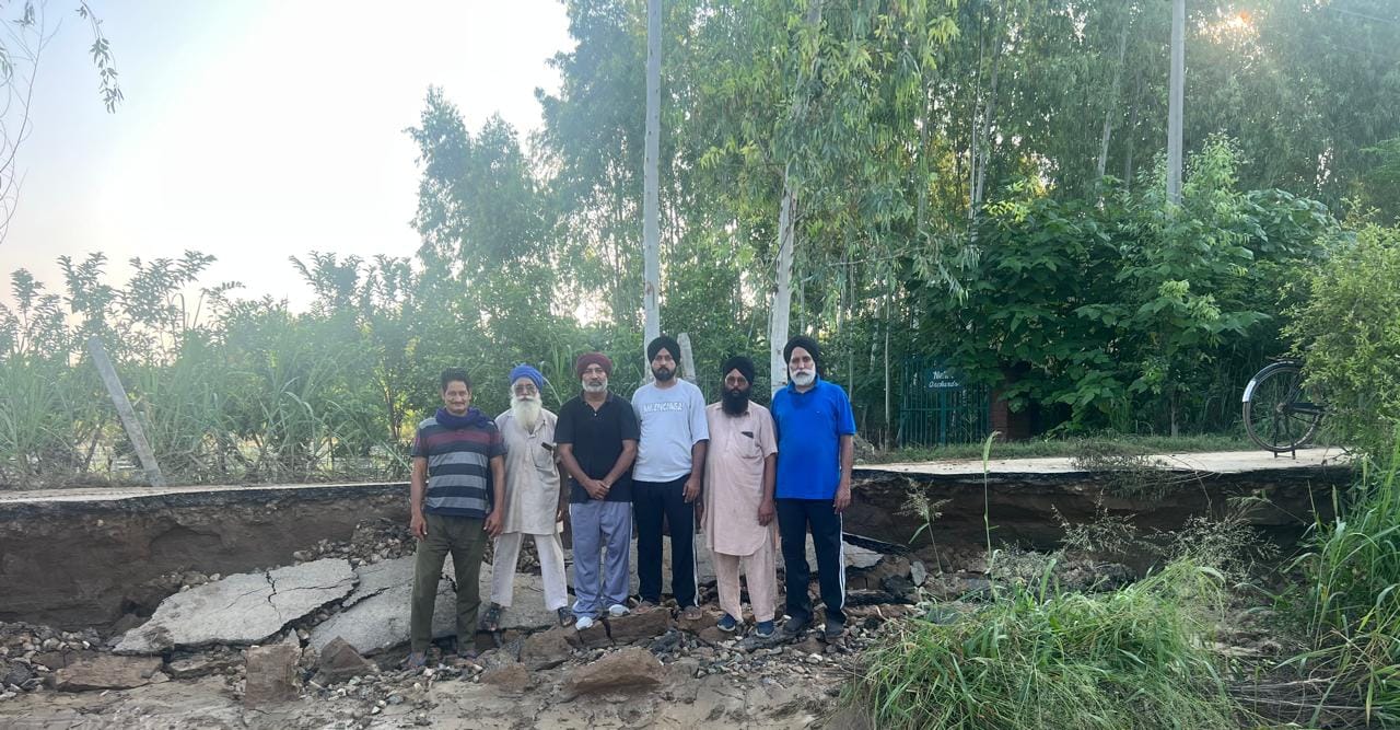 The road connecting the main road from Jian to Jejon has turned into deep gorges near the village of Nangal Khilariya due to floods - Talwinder Heer.
